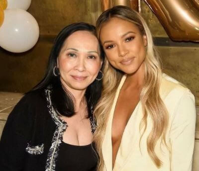 Karrueche Tientrese Tran with her mother in party.